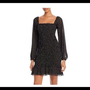 Wayf smocked black mini dress with square neckline
